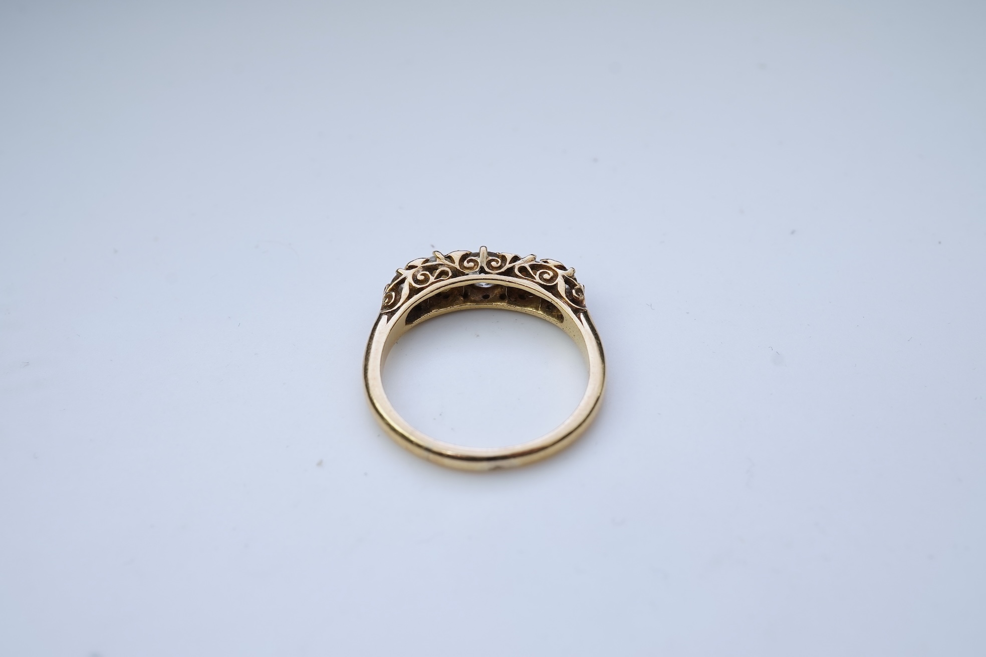 A five-stone pearl and diamond ring, early 20th century